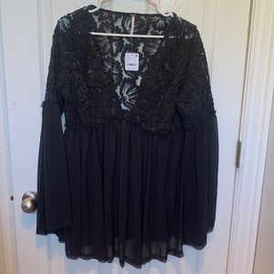 Brand new tags still on black see through tunic from Free People. Never worn.